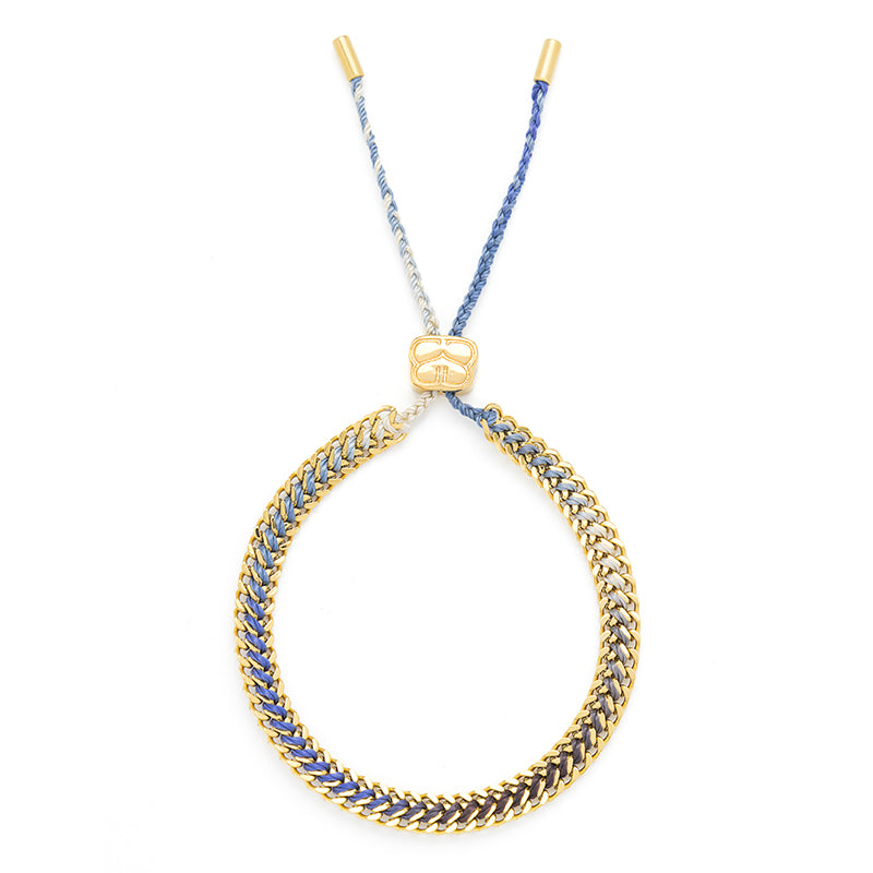 Flat layout of the Denim Athena bracelet with gold accents.