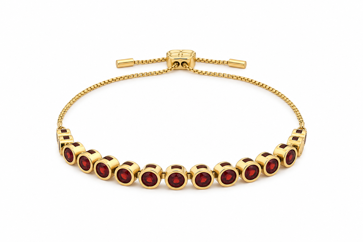 Belis garnet waterproof gold tennis bracelet by Boho Betty – bezel-set deep red garnet stones on an adjustable slider chain, stackable and waterproof