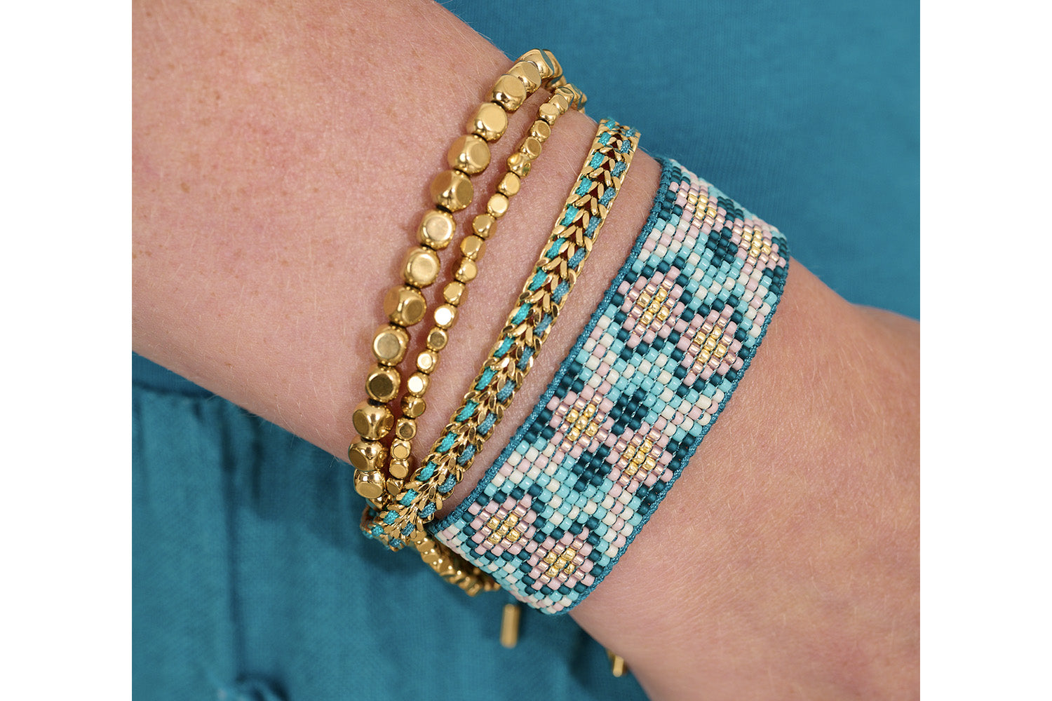 Combine the Charlotte and Cari in Teal Gold for impact and finish off any outfit!
