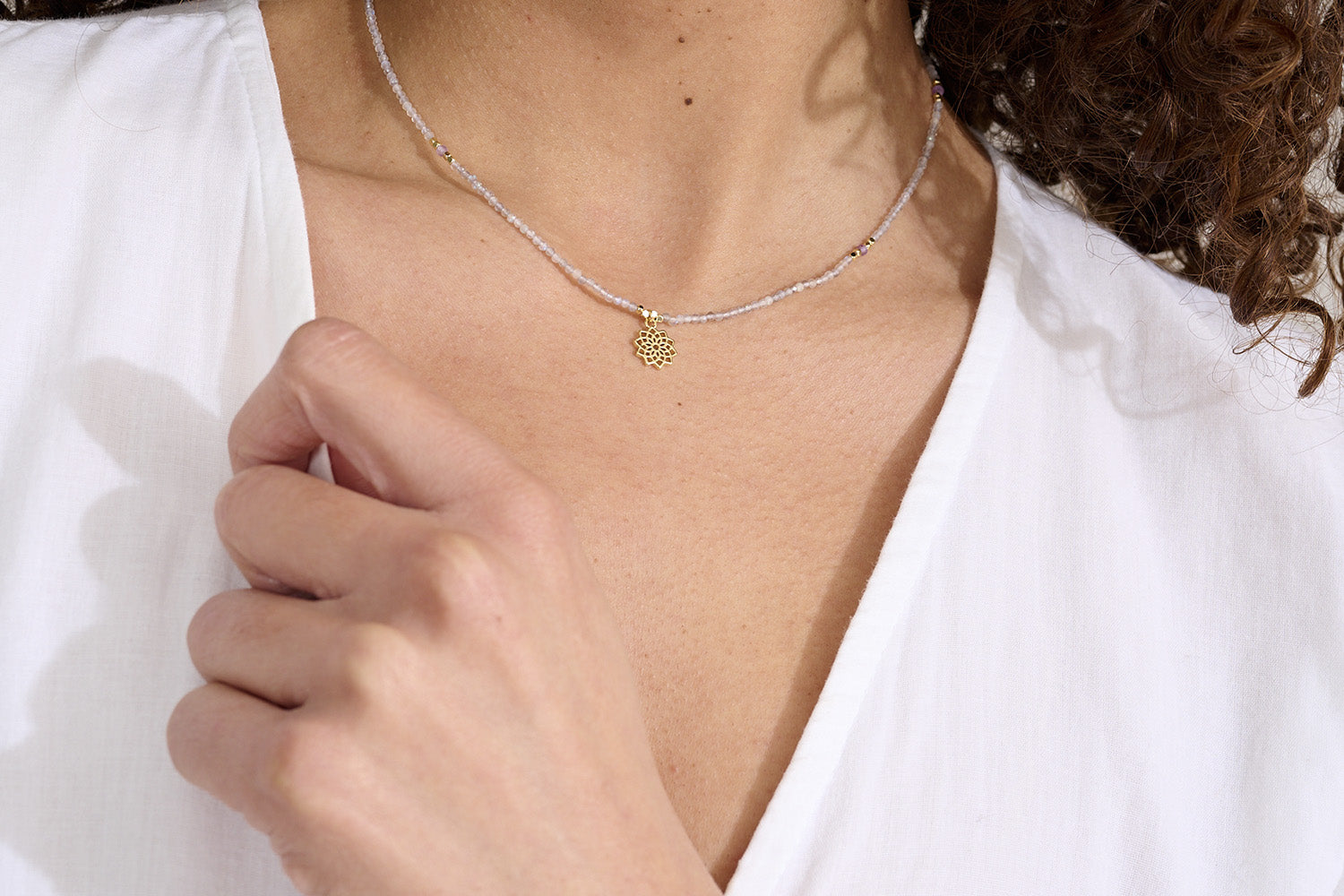 Delicate design and delightful tones radiating from the Labradorite and hints of Amethyst Necklace.