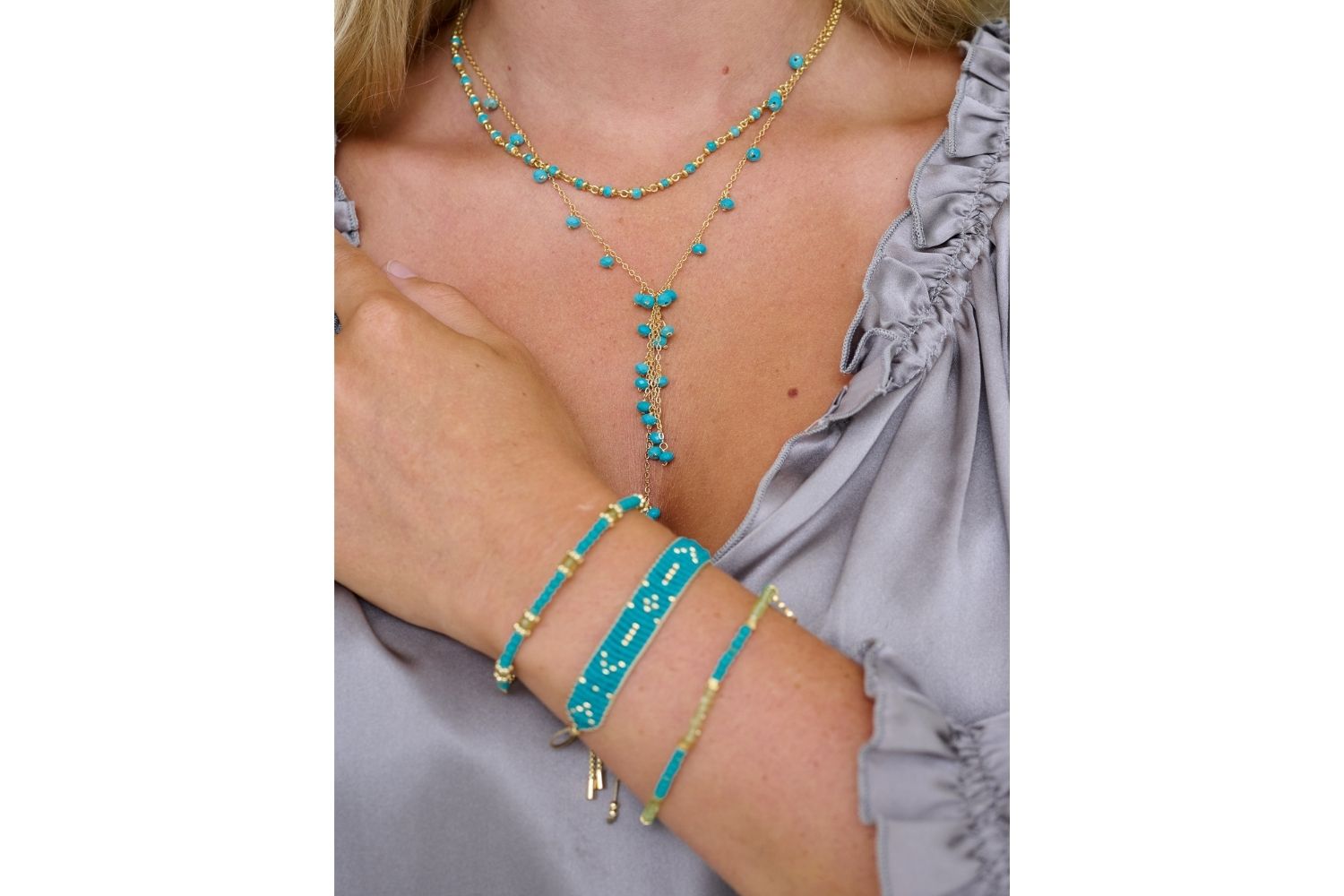 The Boho Betty Grace in Turquoise and gold styled with the Peridot and Turquoise Delight and Cerise bracelets and to complete the look layer the Ivy and Panacea Turquoise Necklaces.