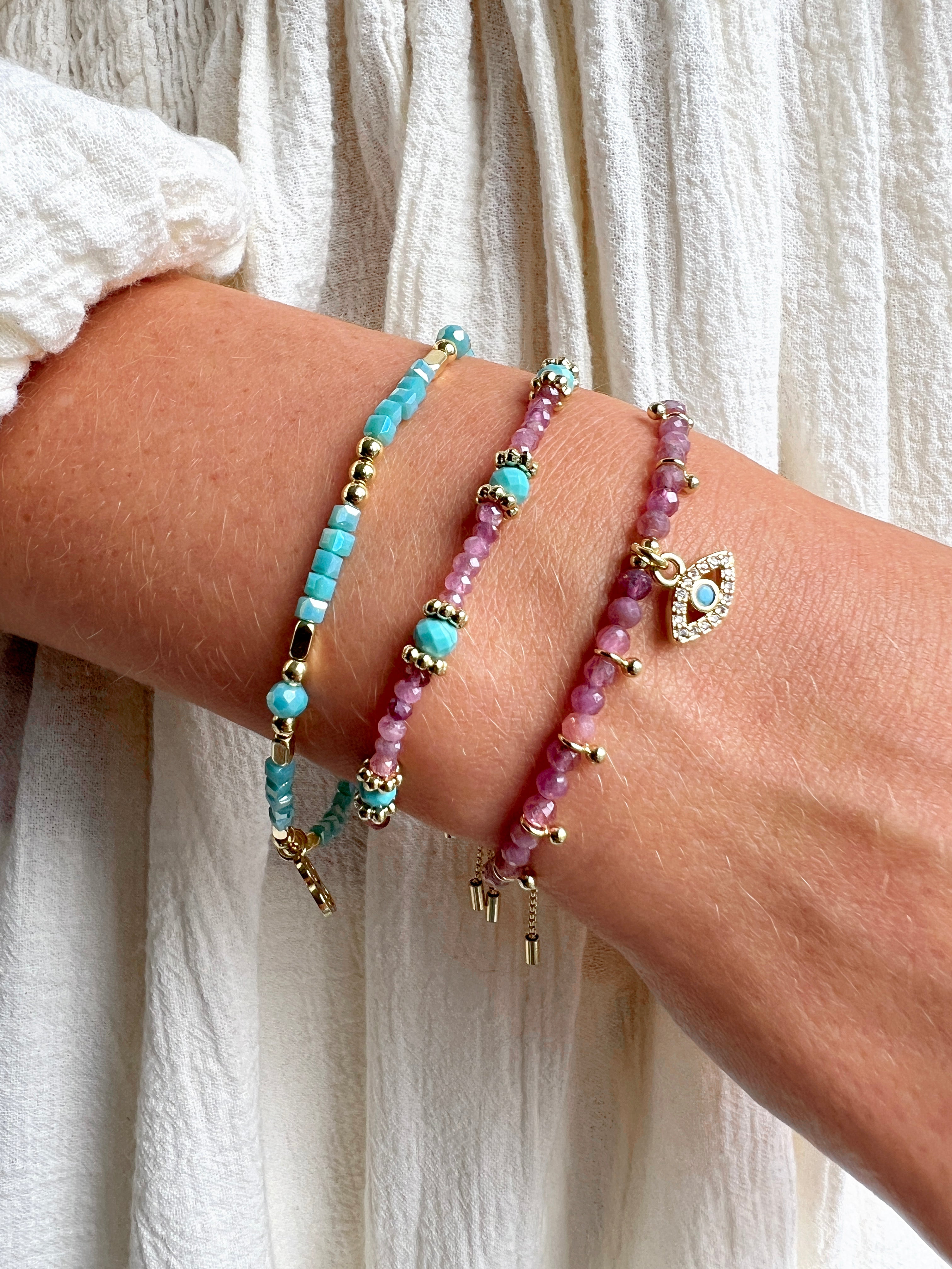 santa-cruz-turquoise-pink-tourmaline-gold-bracelet-stack-lifestyle