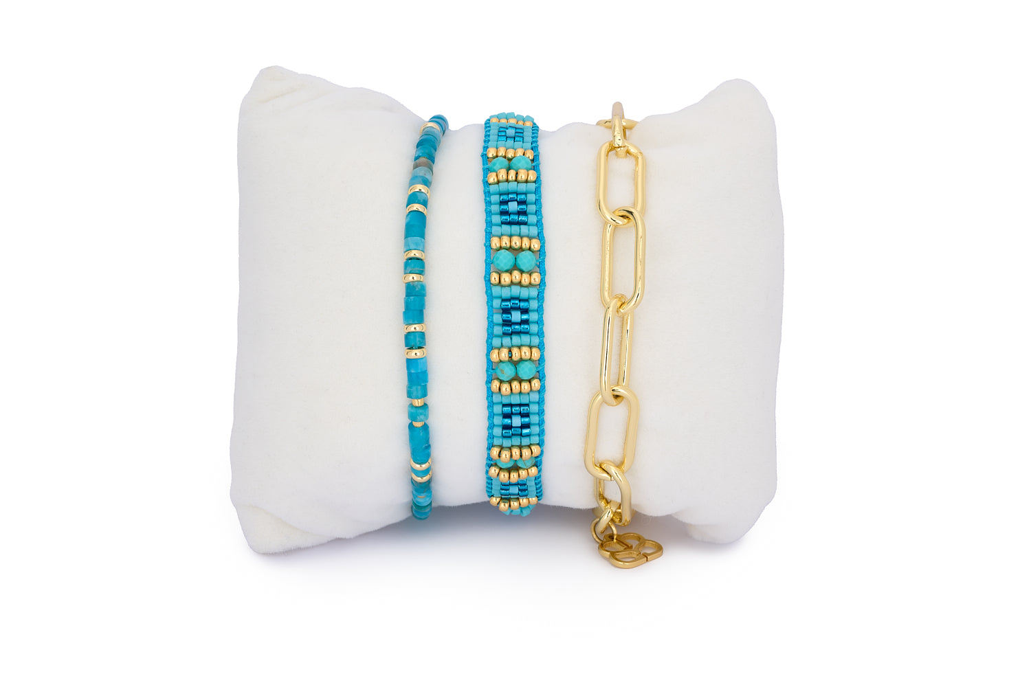 Aruba Apatite & Gold Bracelet Stack featuring ocean-blue Apatite beads, woven turquoise howlite, and a chunky gold chain link bracelet in a beachy, boho-luxe design.