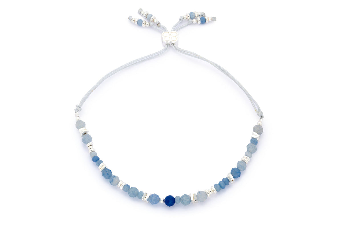 Bliss Blue Aventurine Silver Bracelet featuring natural blue aventurine gemstones, waterproof silver PVD stainless steel accents and an adjustable slider bracelet design.