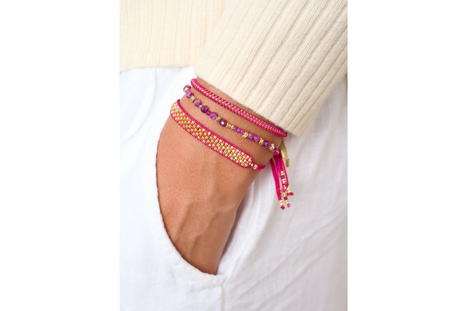 Bliss Ruby Gold Bracelet styled on the wrist, showcasing its radiant ruby gemstones, gold details, and a passionate, confident boho aesthetic, perfect for stacking or wearing solo.