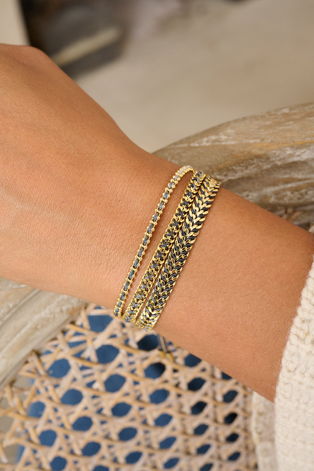 Braid charcoal and gold bracelet featured on wrist with Boho Betty stacking bracelets