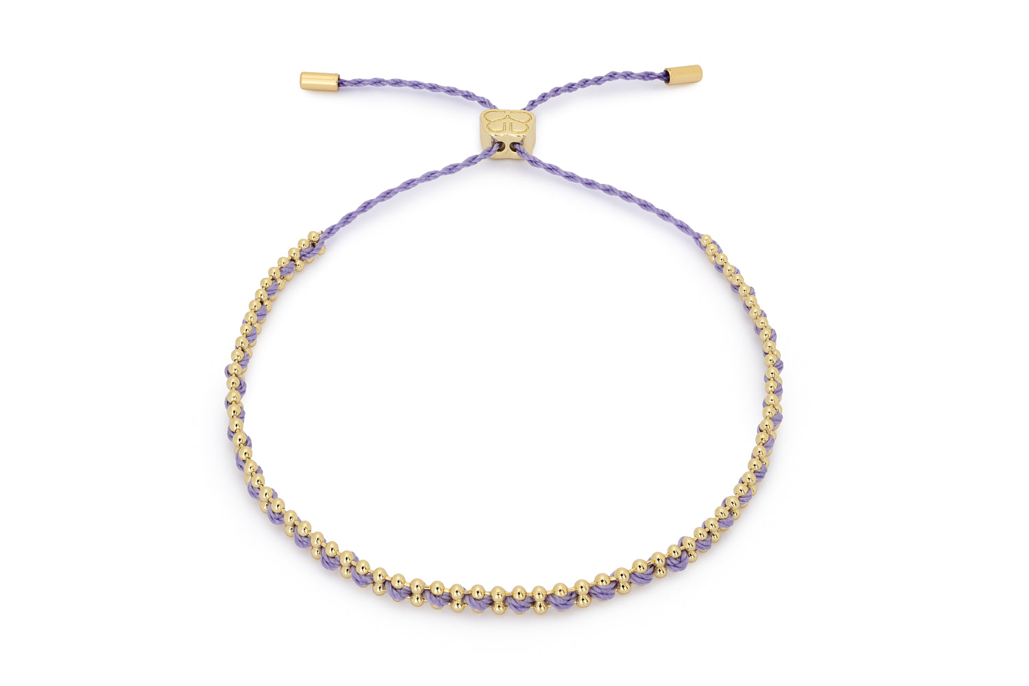 Braid Gold & Lilac Woven Bracelet featuring a soft lilac woven cord, gold-toned chain, and an adjustable pull-through slider fastening for a comfortable, versatile fit.