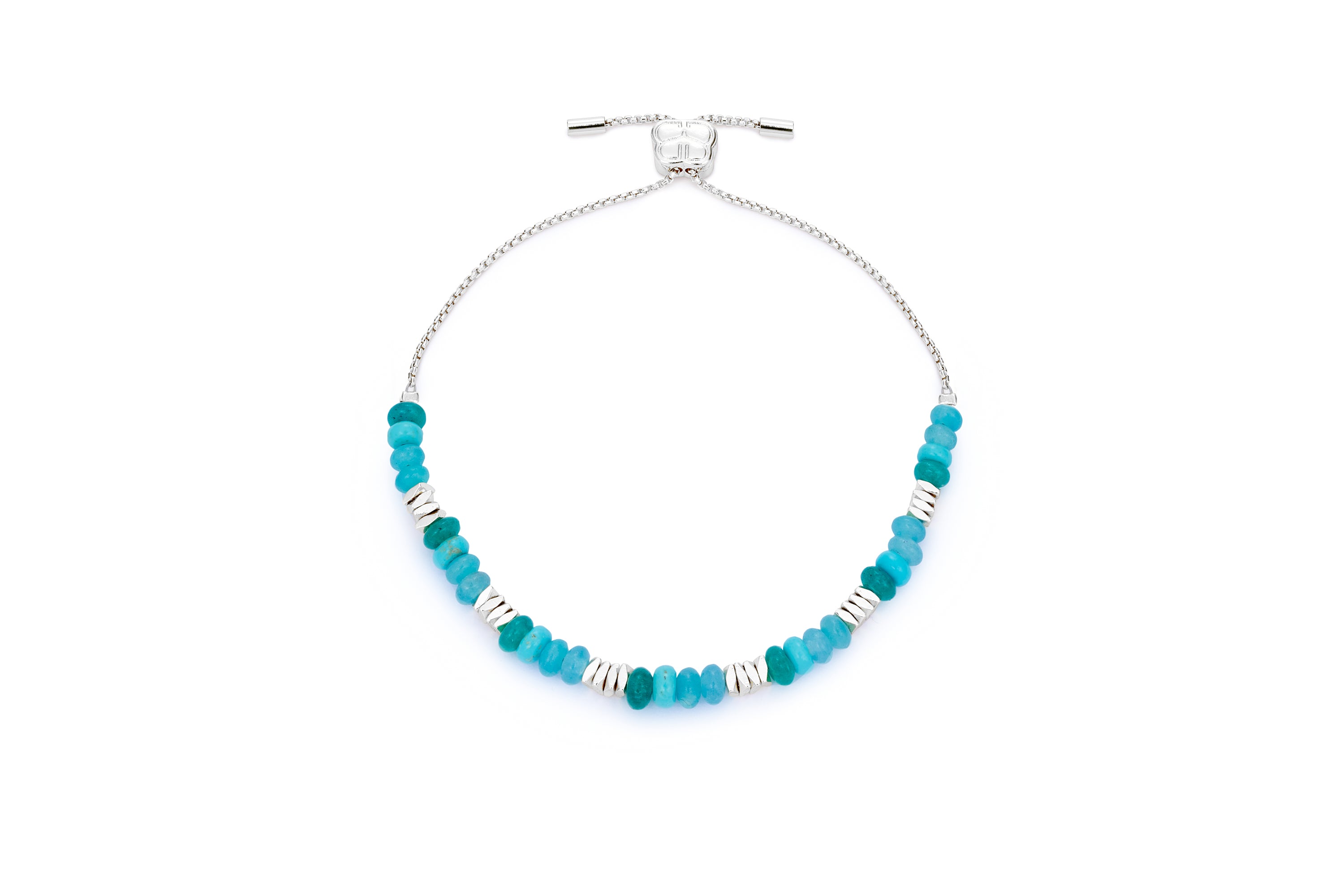 Carmine Silver, Turquoise Howlite & Jade Bracelet featuring a mix of vibrant turquoise and jade-coloured beads, accented with sterling silver-plated details and an adjustable slider fastening.