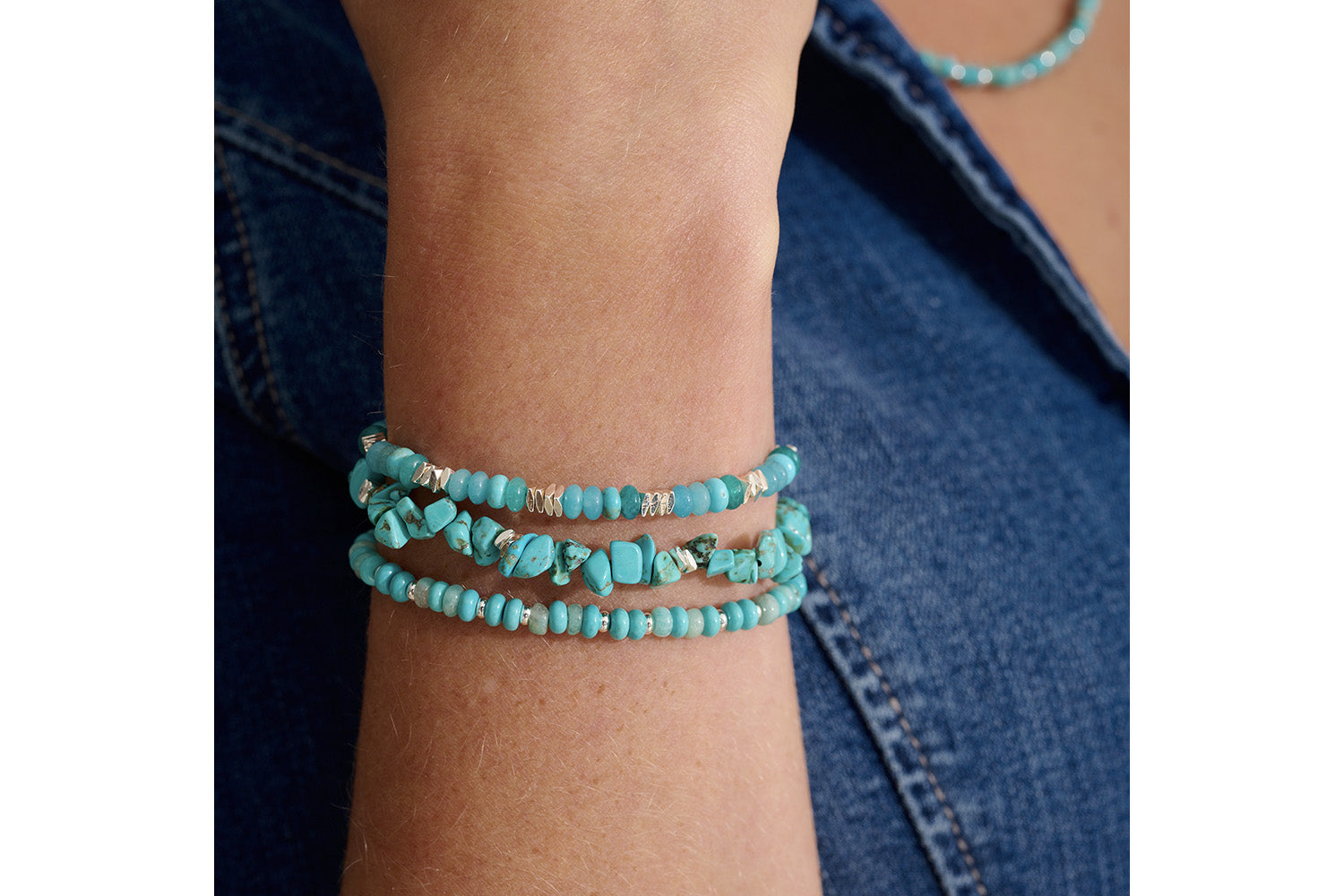 Carmine Silver, Turquoise Howlite & Jade Bracelet styled on the wrist, showcasing ocean-blue and jade-green tones with polished silver accents—perfect for layering or wearing solo.