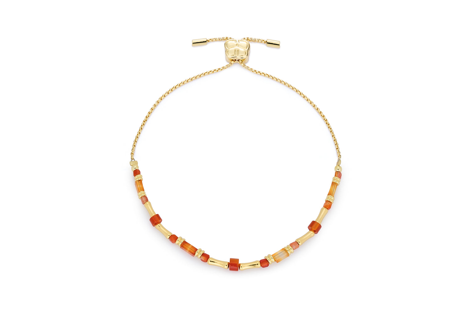 Chiara Gold & Orange Agate Gemstone Bracelet featuring smooth tube-shaped orange agate beads, unique bamboo-shaped gold metal beads, and an adjustable chain slider fastening.