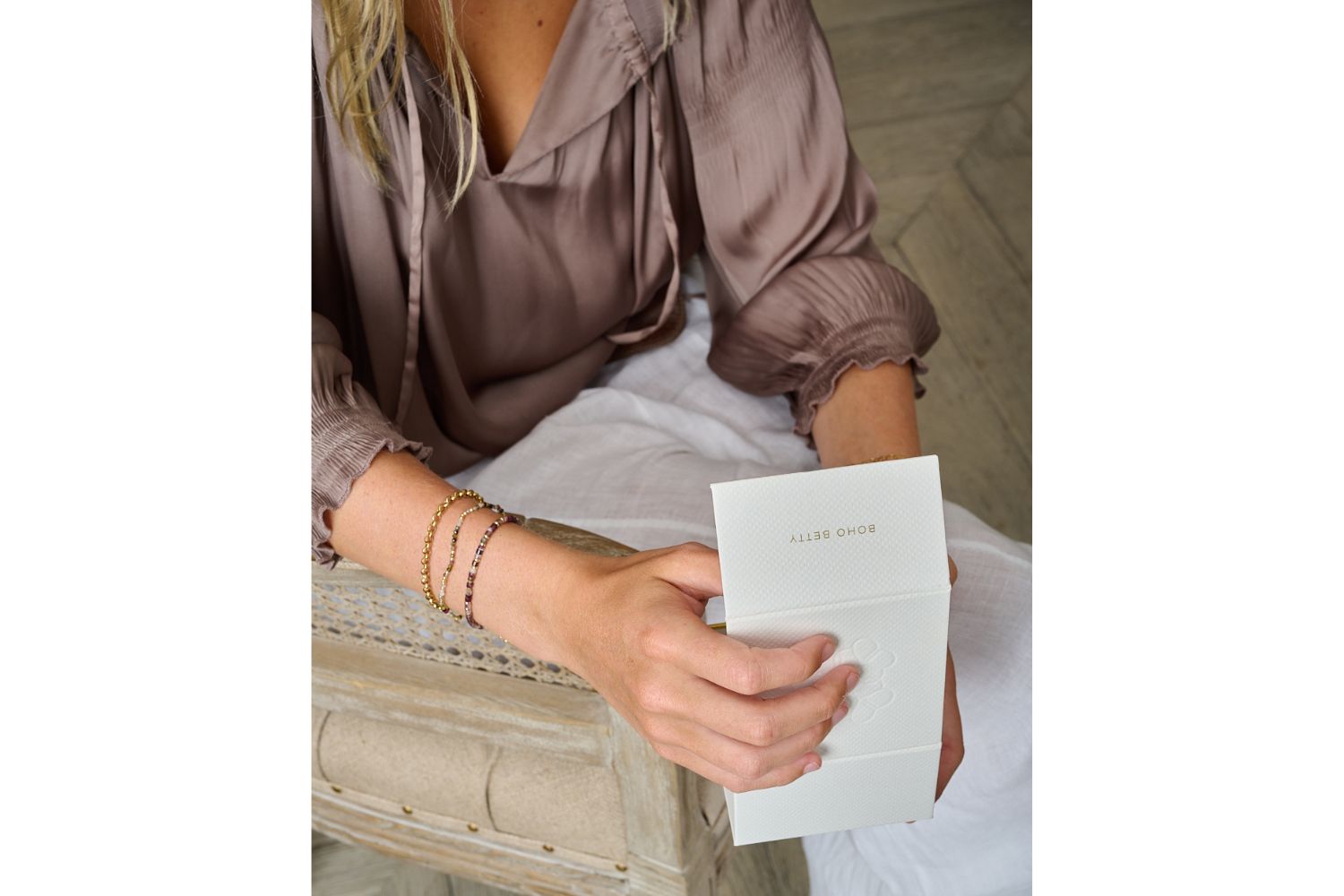 Chira Tourmaline & Gold Stacking Bracelet Set featured on wrist with Boho Betty stacking bracelets