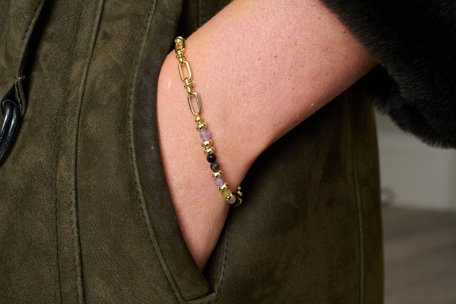 Dahlia Gold & Tourmaline Gemstone Beaded Bracelet featured on wrist with Boho Betty stacking bracelets in colourful gemstone and gold tones.