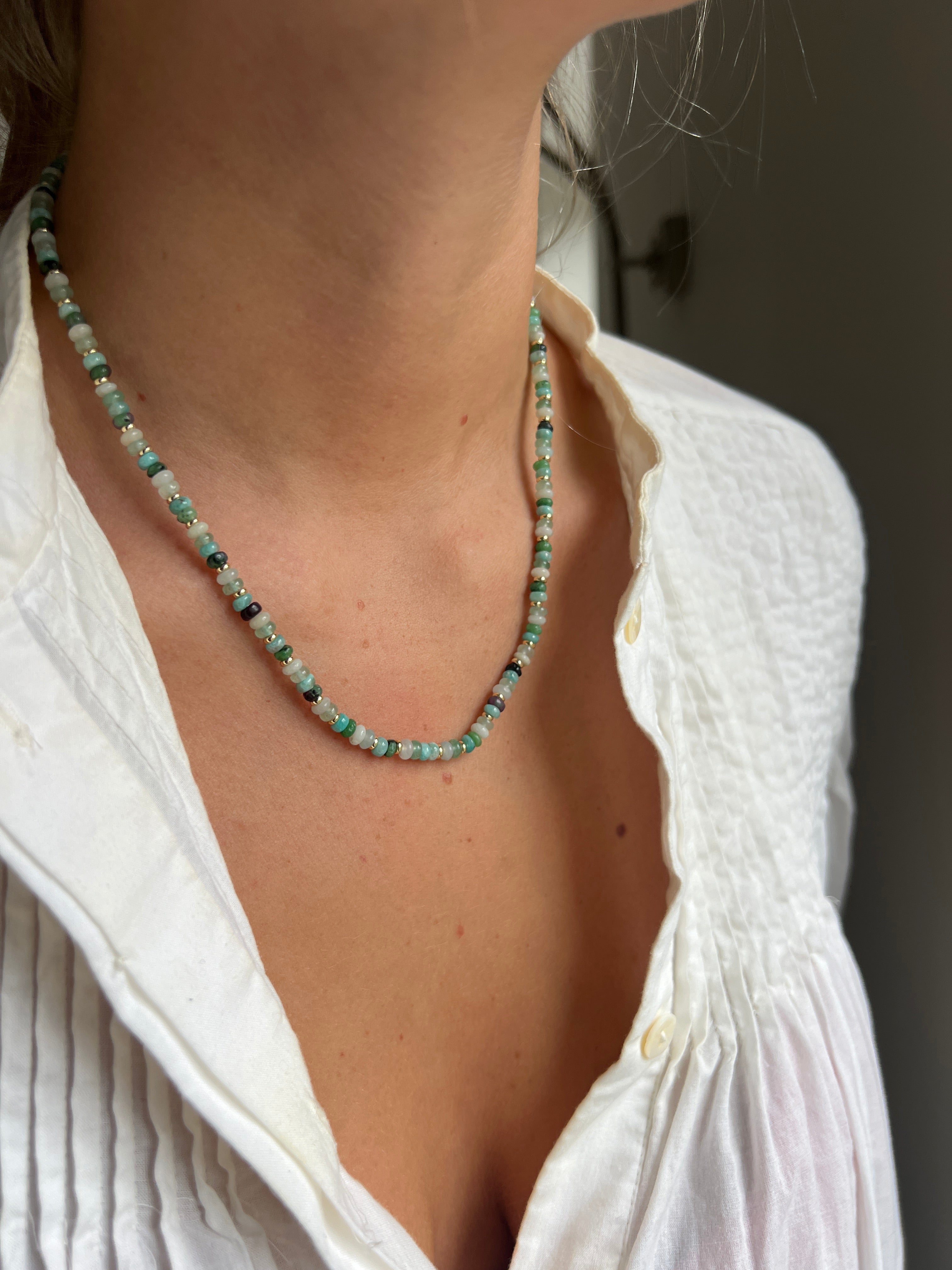 Emma Gold & Amazonite Mix Gemstone Beaded Necklace styled for everyday chic and statement occasions, showcasing vibrant green and white gemstone beads with shimmering gold accents.
