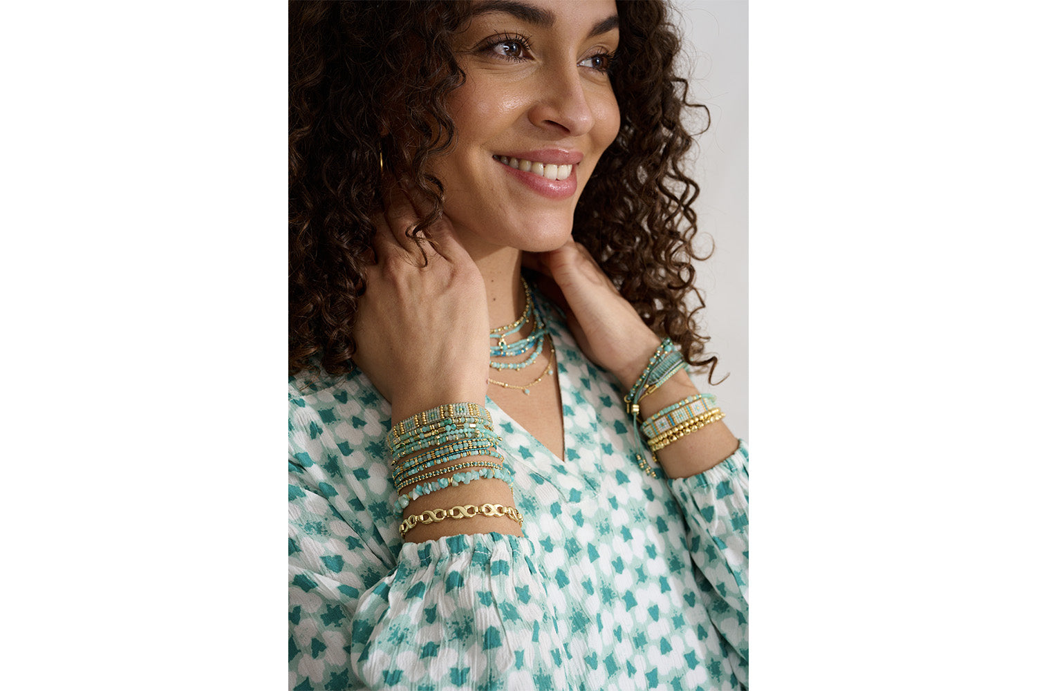 Faye Gold & Turquoise Beaded Bracelet styled on the wrist, showcasing colourful Miyuki beads and shimmering gold accents—perfect for layering or wearing solo.