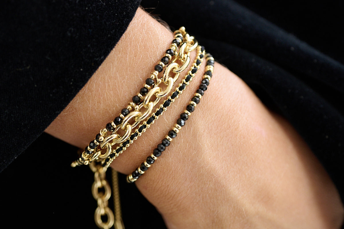Harmony Black Spinel Bracelet styled with gold jewellery