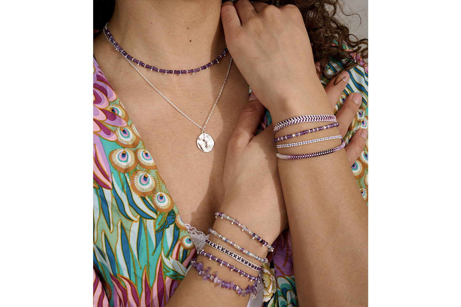 Harmony Silver & Rainbow Fluorite Gemstone Bracelet styled on the wrist, showcasing its delicate pastel hues, silver accents, and effortlessly chic boho-luxe design.