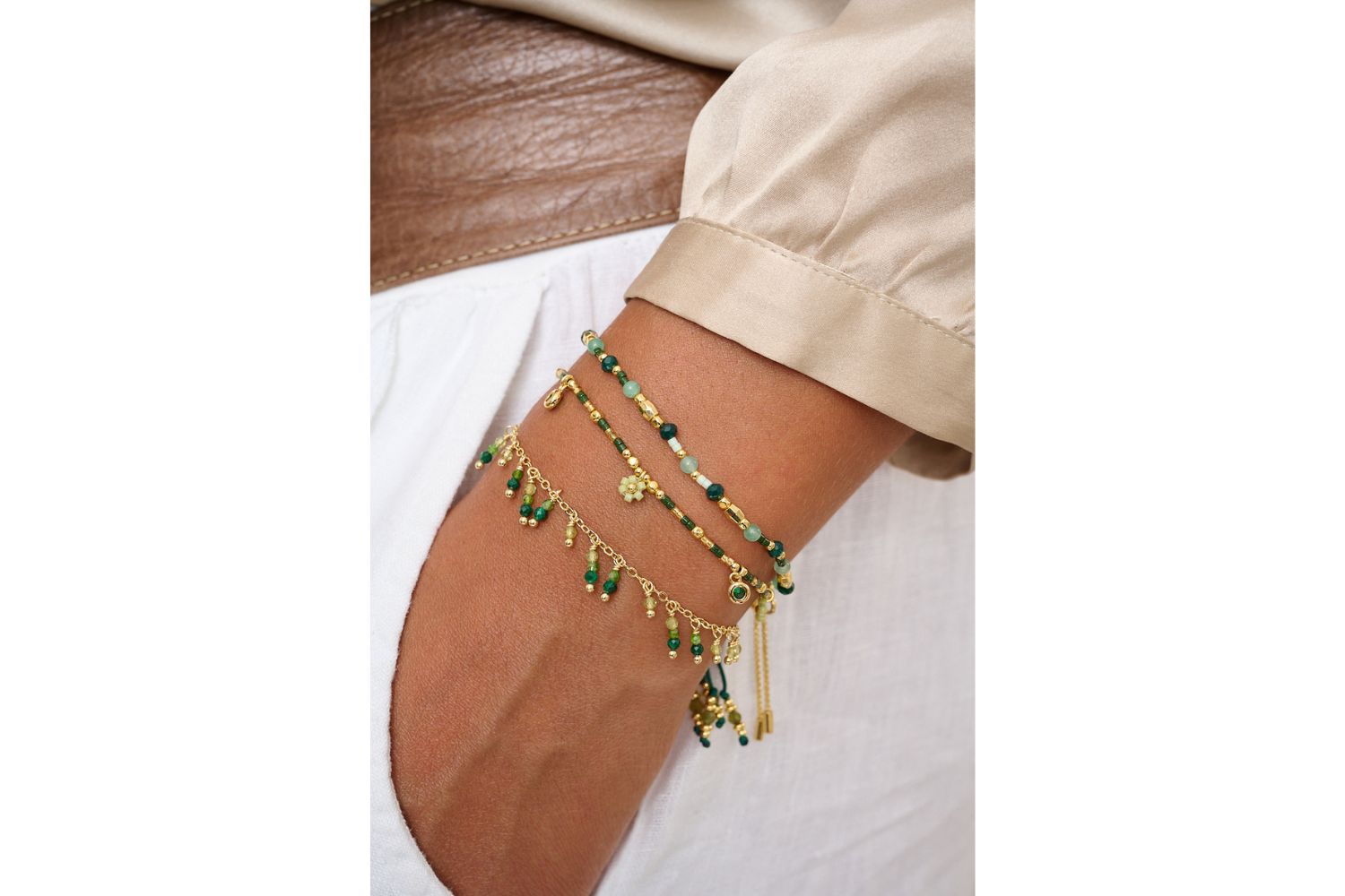 Heather malachite and green gemstone bracelet featured on wrist with Boho Betty stacking bracelets