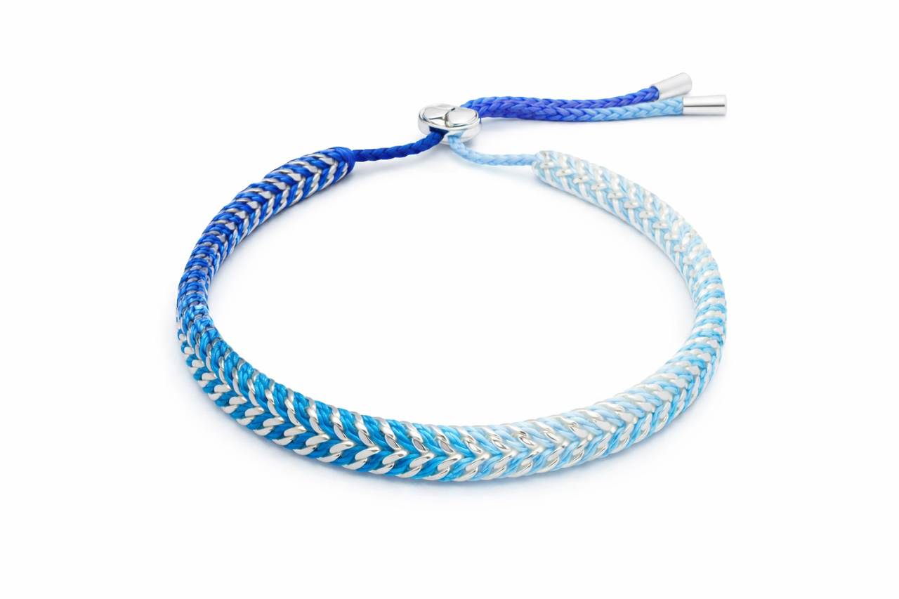 Iztac Midnight Silver braided bracelet in ombré blue shades with silver accents on white background