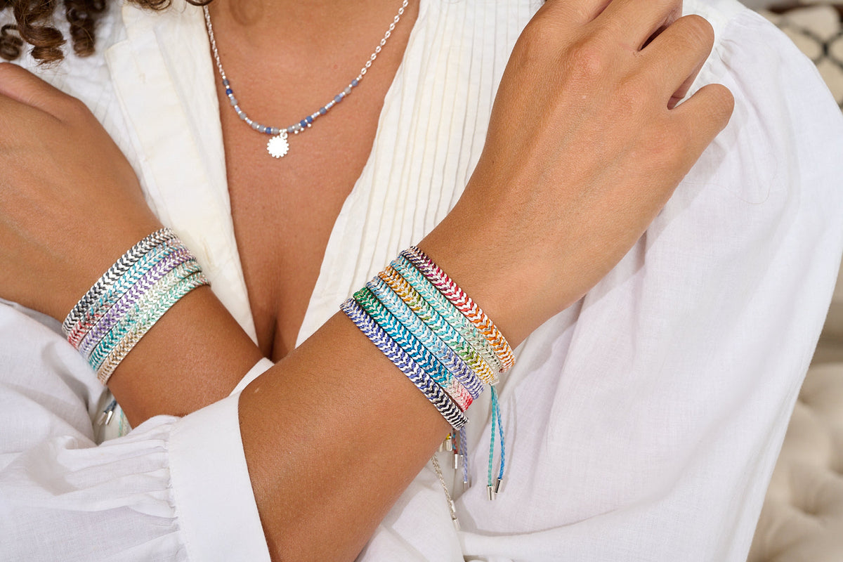 Iztac Rainbow Silver Braided Bracelet styled on the wrist