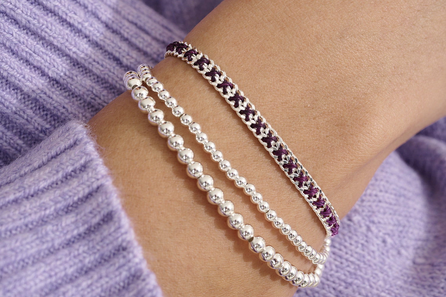 Jeju Purple & Silver Bracelet Stack styled with soft purple tones and high-shine silver for a bold yet elegant boho-inspired look.