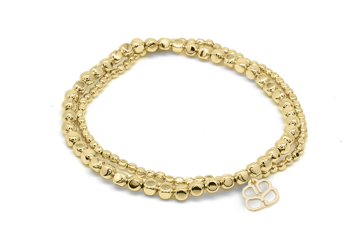Kamala Minor Gold Stretch Bead Bracelet Set featuring two delicate nugget bead bracelets (2mm & 4mm) with a comfortable elasticated fit and high-quality PVD gold plating, perfect for layering.