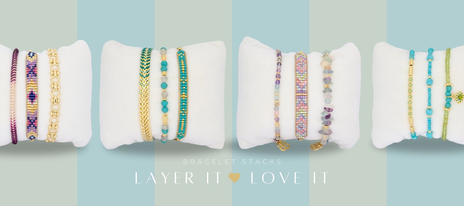 Selection of Bracelet Layering Stacks from Boho Betty on a stripey background – Layer up with love and let your wrist shine with Boho Betty’s layering bracelets, because life is better with a little stackable sparkle!