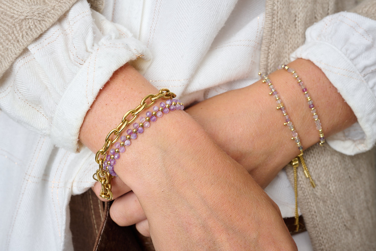 Marisol Amethyst & Gold Beaded Friendship Bracelet featured on wrist with Boho Betty stacking bracelets in lilac and gold gemstone tones.