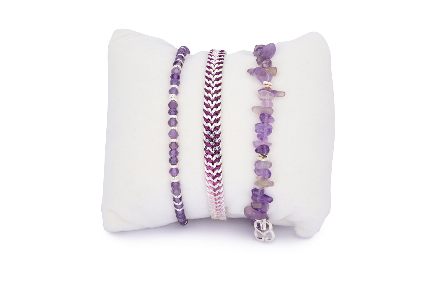 Maupiti Silver & Amethyst Gemstone Stacking Bracelet featuring three coordinated purple-toned bracelets—raw crystal, ombré woven, and polished bead styles with silver-plated accents.