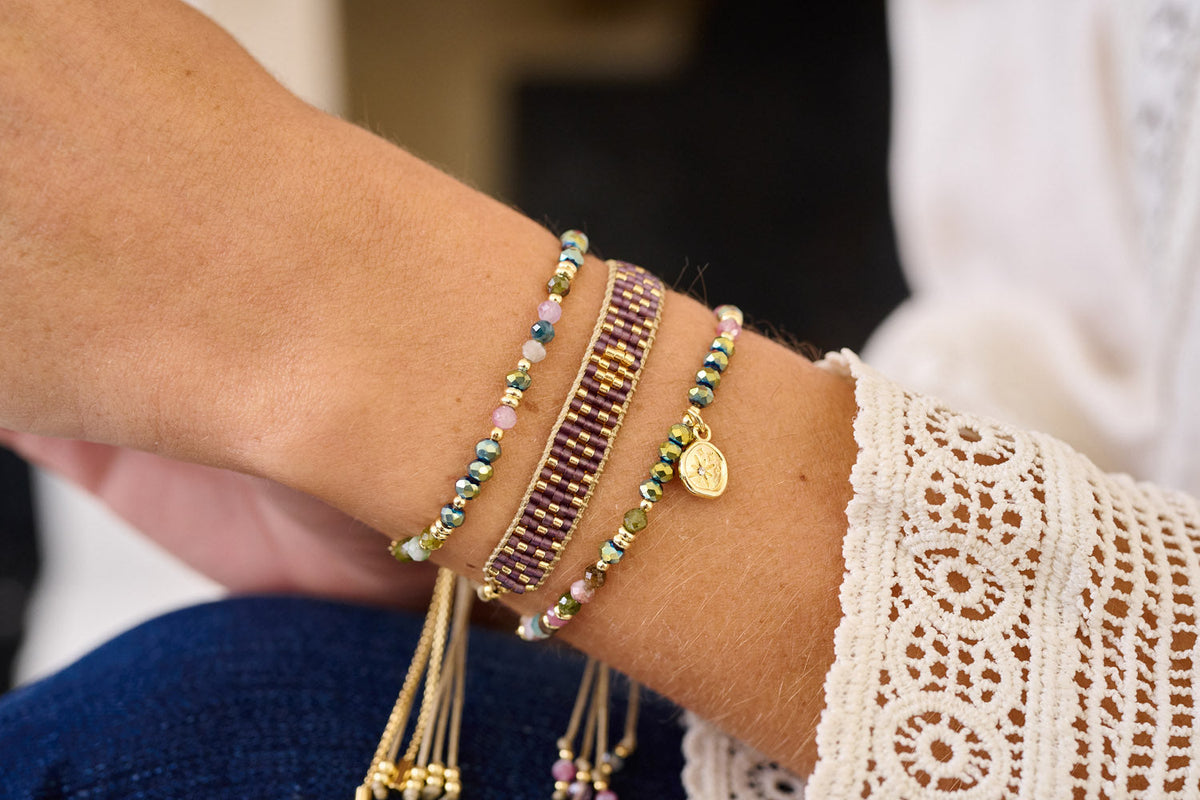 Opulent Tourmaline Gold Slider Bead Bracelet styled with other bracelets