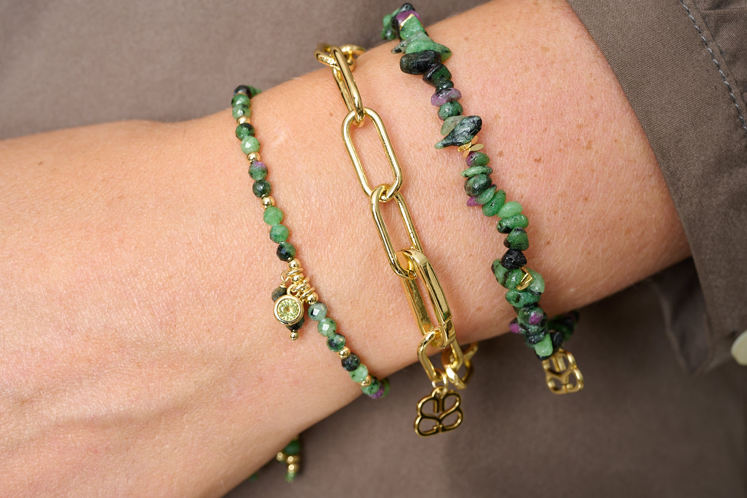 Parida Ruby Zoisite & Gold Bracelet Stack styled on wrist with Boho Betty layers, showing chunky chain, ruby zoisite beads and charm movement