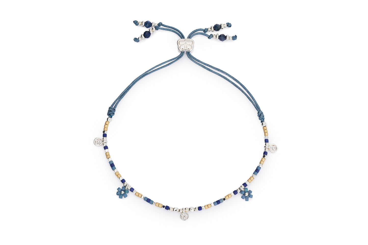 Rania Denim & Silver Beaded Charm Bracelet featuring denim-toned matte beads, silver-plated accents, floral charms, and an adjustable cord slider.