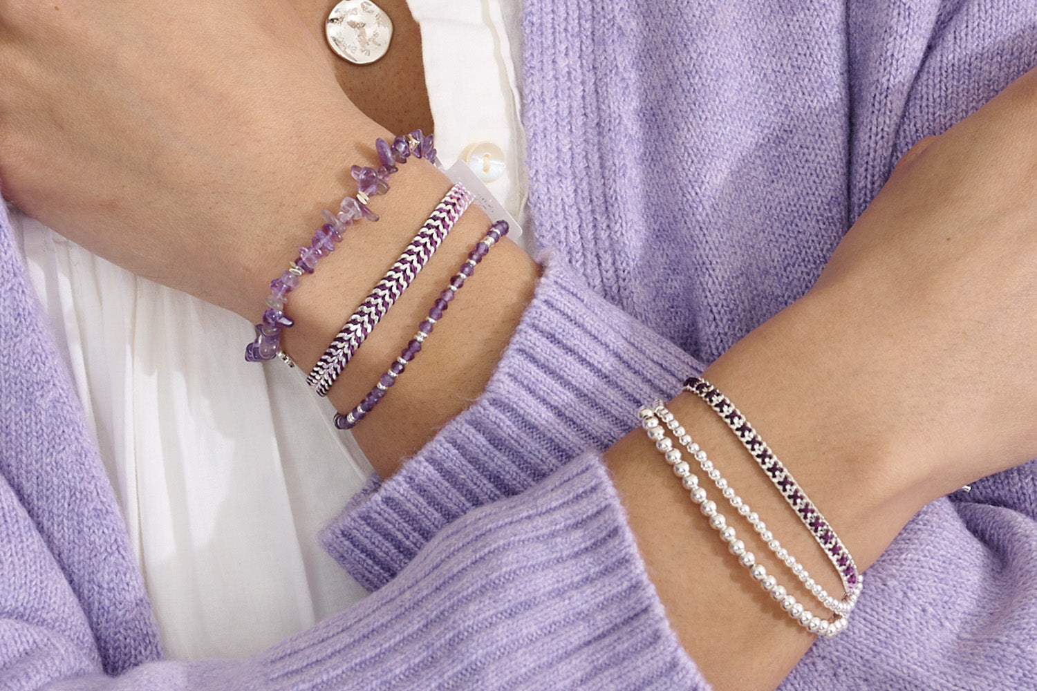 Sana Amethyst & Silver Bracelet styled on the wrist, showcasing deep purple Amethyst gemstones, silver details, and a mystical boho aesthetic—perfect for layering.