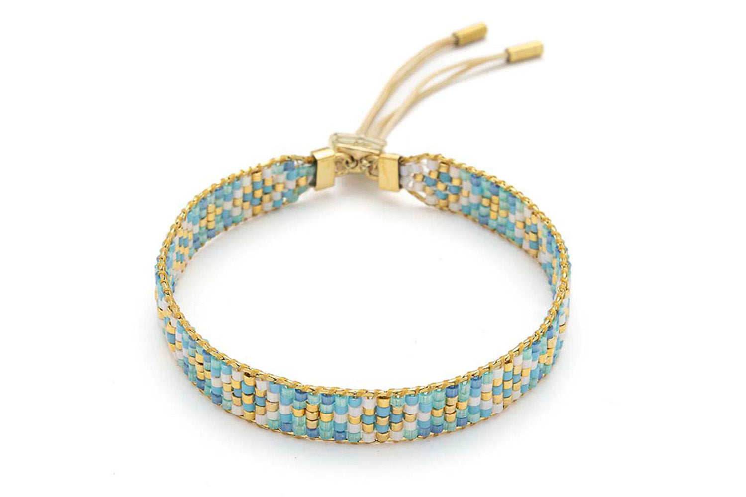 Saskia Aqua Gold Friendship Bracelet featuring handwoven Miyuki beads in soft aqua, blue, and gold, finished with a 12k gold-plated adjustable slider fastening.