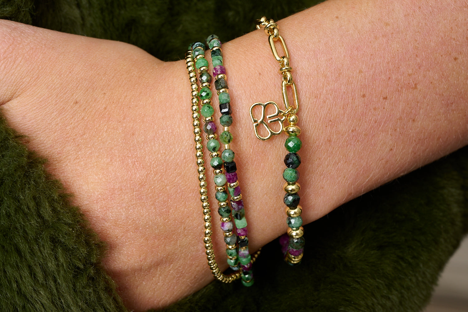 Solarte Ruby Zoisite Bracelet Stack styled on wrist, layered wrap beads with sleek gold paperclip chain