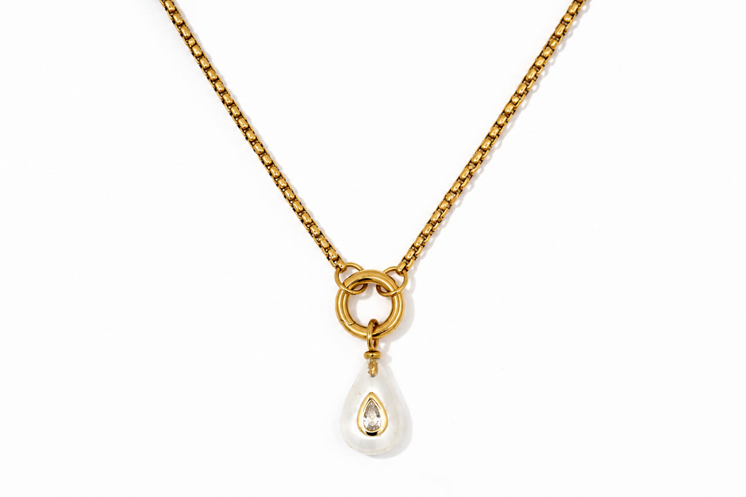 Thalia Short Clear Quartz Teardrop Pendant Necklace featuring a clear quartz gemstone with sparkling crystal on a waterproof 14k gold PVD chain.