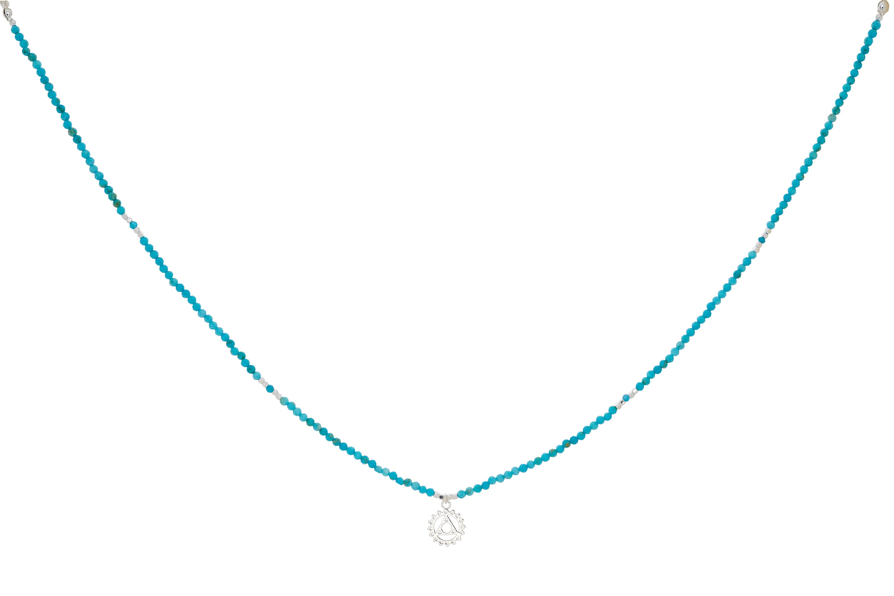 Turquoise Howlite, Apatite & Silver Throat Chakra Necklace featuring calming blue gemstone beads, a sterling silver-plated chakra charm, and an adjustable chain for effortless styling.