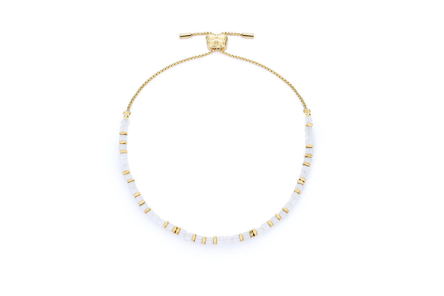 Valentina Gold & Rainbow Moonstone Bracelet featuring soft glowing rainbow moonstone beads, 12k gold-plated accents, and an adjustable slider fastening for a custom fit.