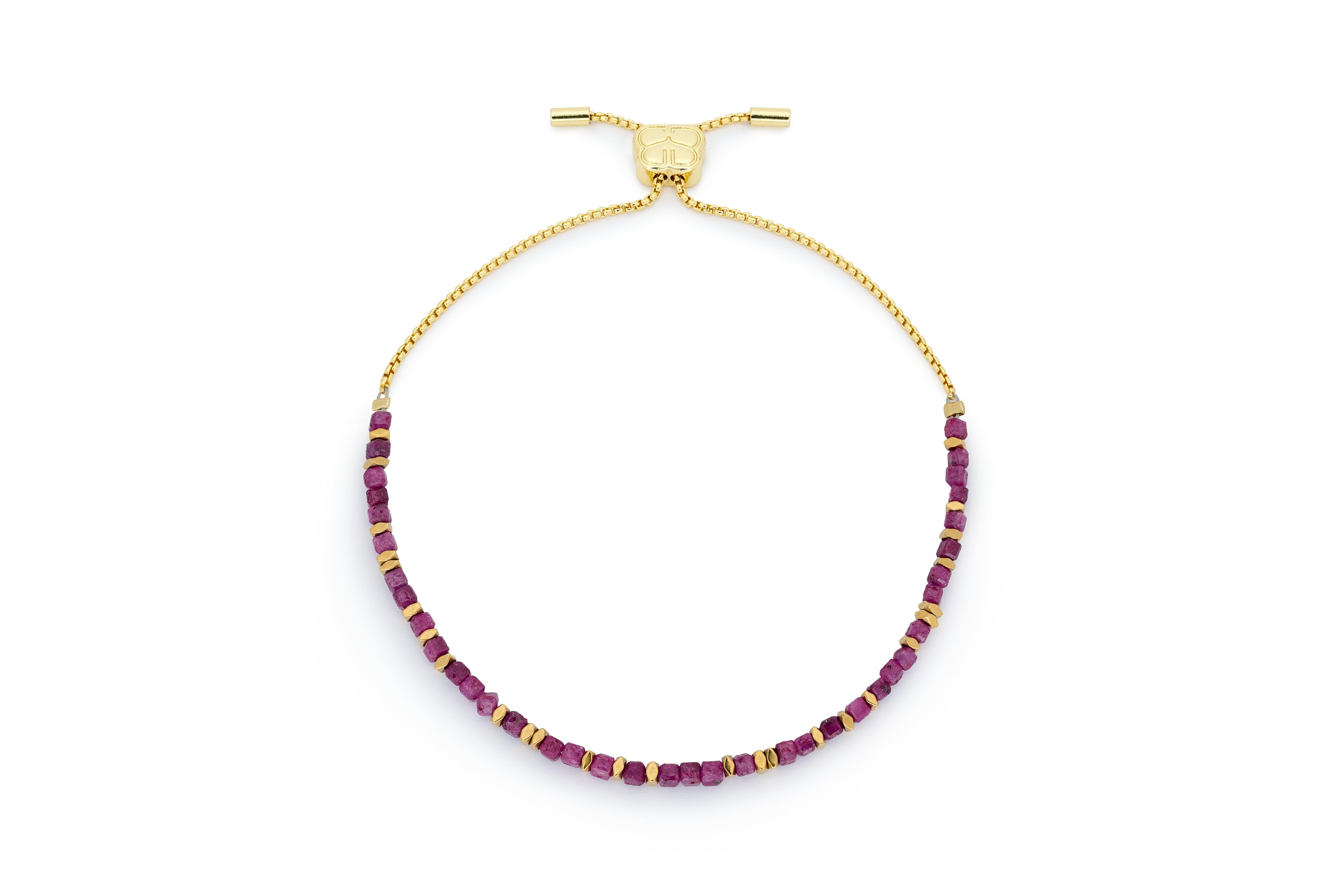 Valentina Gold & Ruby Gemstone Bracelet featuring natural ruby gemstones, 12k gold-plated accents, and an adjustable slider chain for the perfect fit.