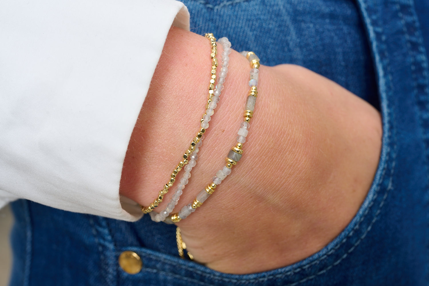 Ventana bracelet stack styled with denim, soft grey labradorite and warm gold for effortless glow.