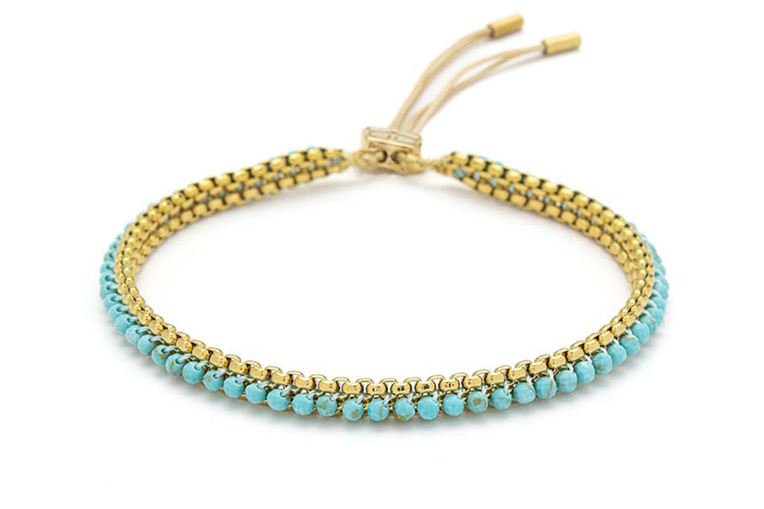 Zena Turquoise Howlite Gold Braided Bracelet featuring vibrant turquoise howlite gemstones, delicate 12k gold-plated chain details, and an adjustable slider fastening.