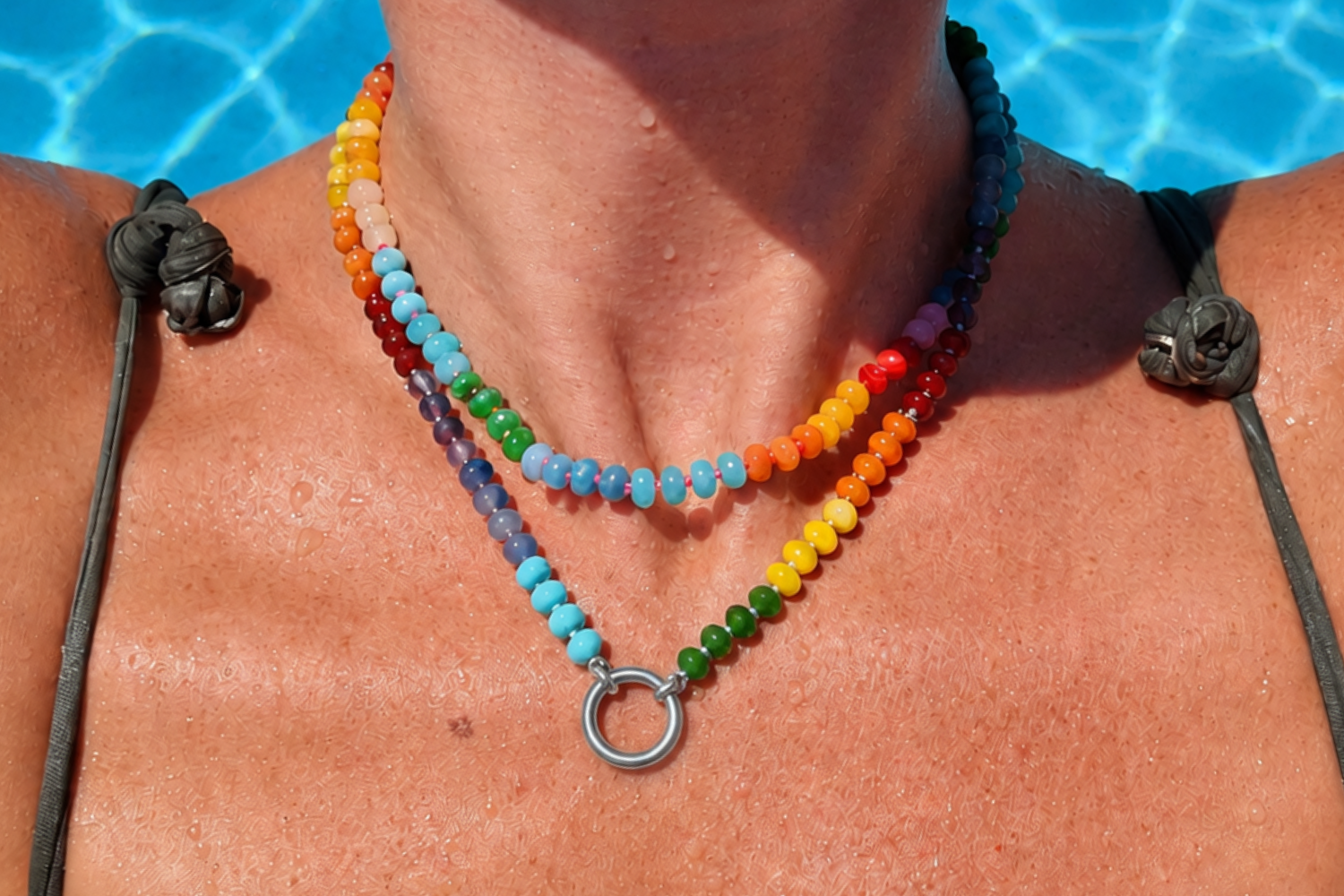 Amala Rainbow Bead Silver Charm Carrier Necklace worn layered, featuring colourful rainbow gemstone beads and a waterproof white gold plated charm carrier clasp.