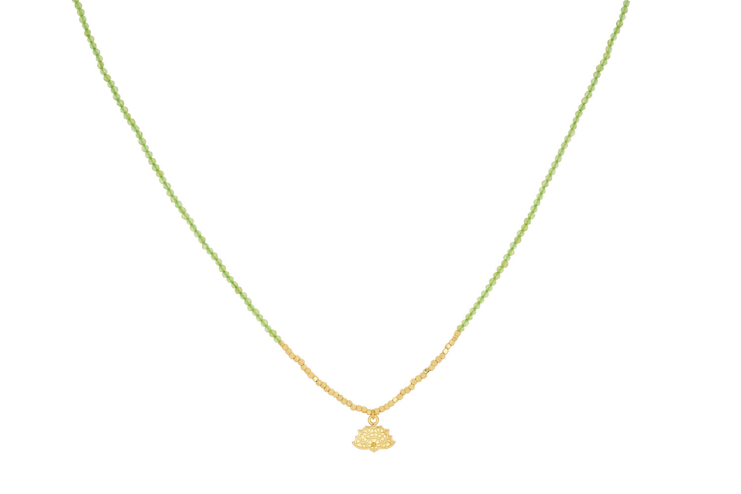 Bia Lotus Charm Gold Necklace featuring vibrant peridot stones and a 12k gold-plated lotus charm, perfect for layering or wearing solo.