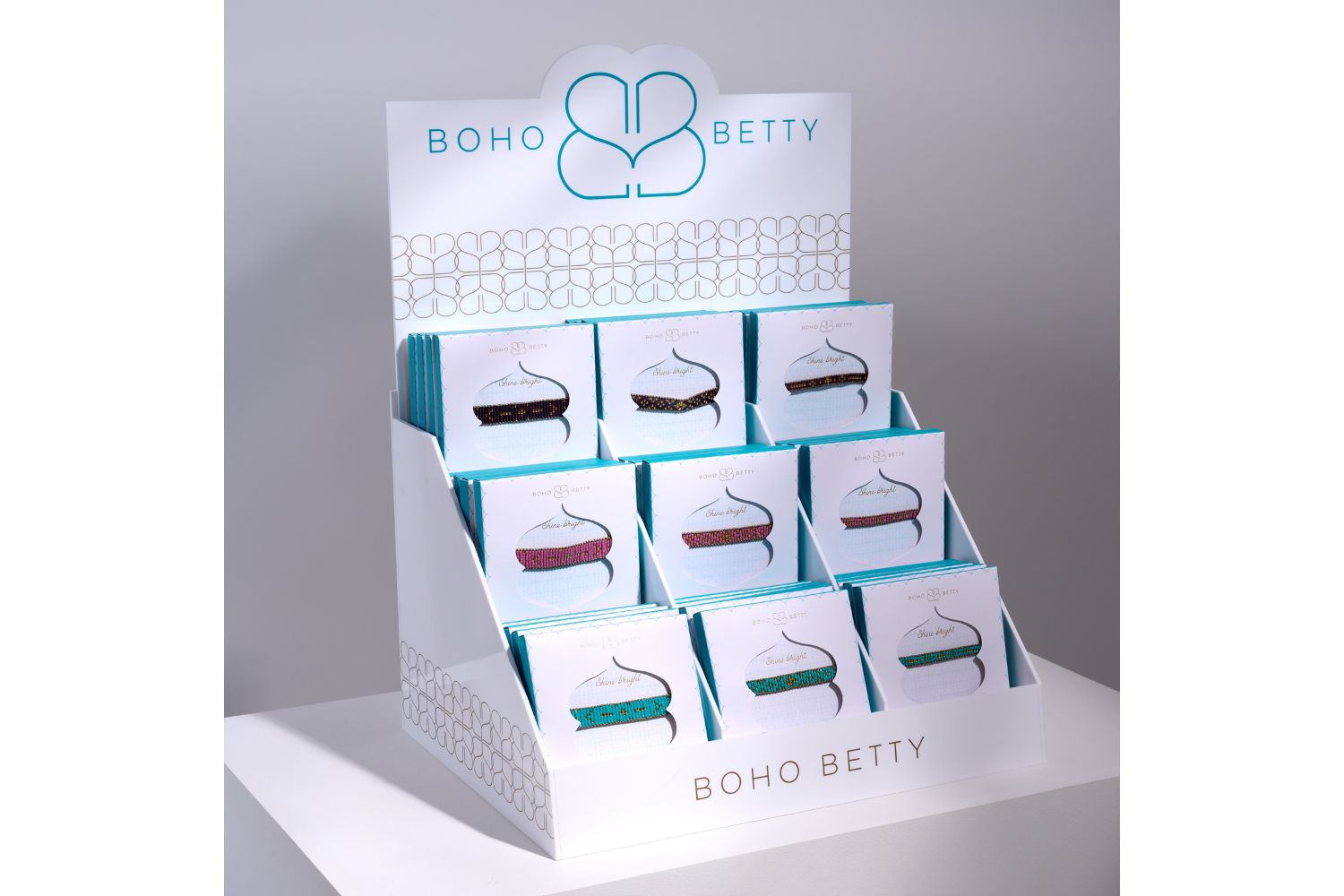 The beautifully branded Boho Betty Acrylic POS ready to fill with packaged jewellery.