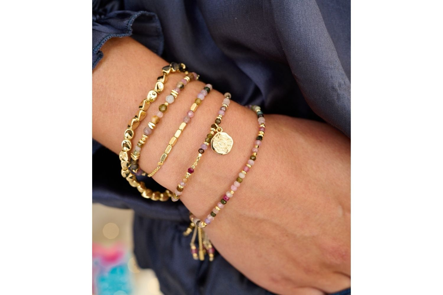 The Boho Betty Gold Fern, looks great layered with tourmaline and gold hues!