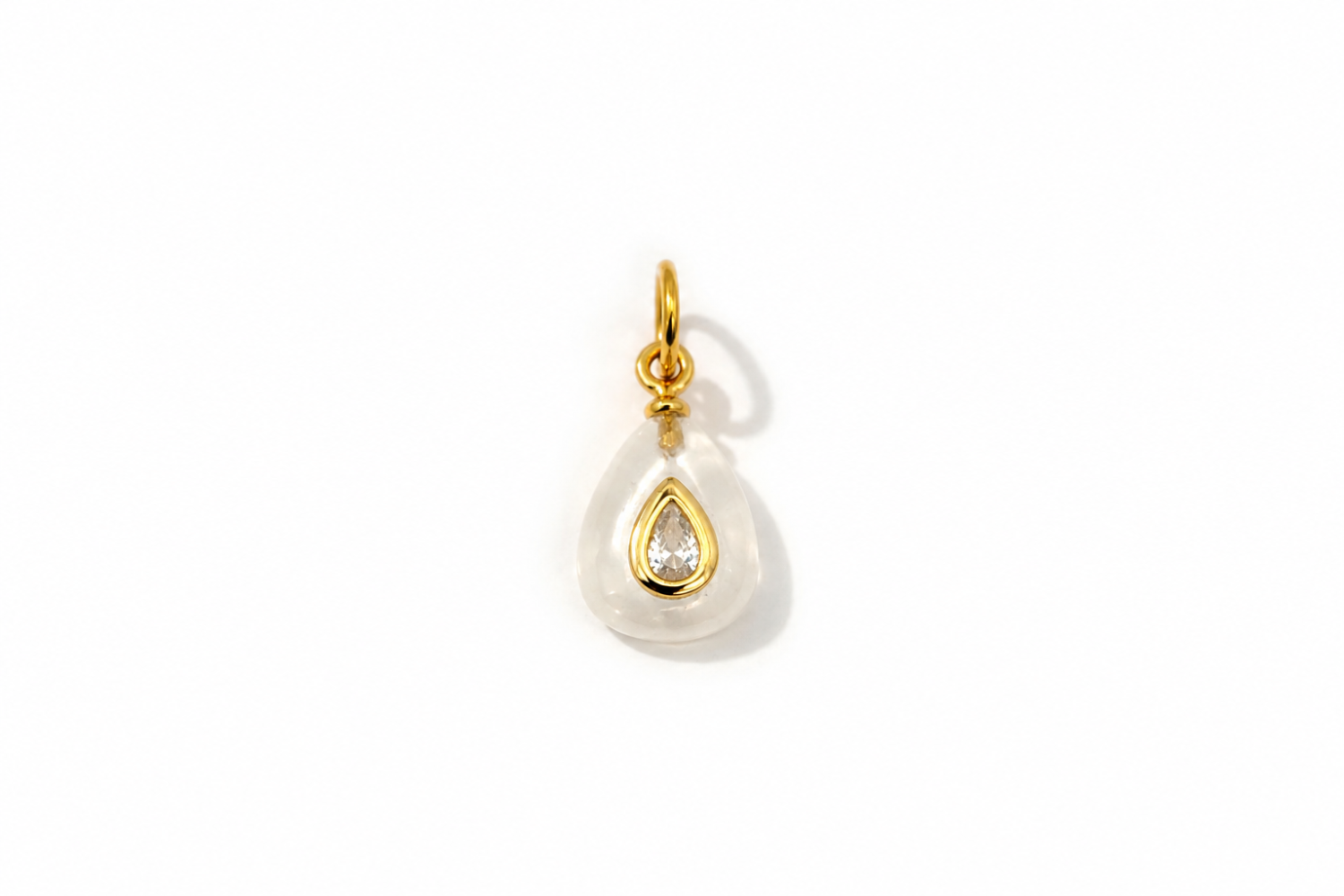 Fleurette Clear Quartz Charm Gold featuring a carved clear quartz gemstone with a sparkling crystal on a waterproof 14k gold PVD loop.
