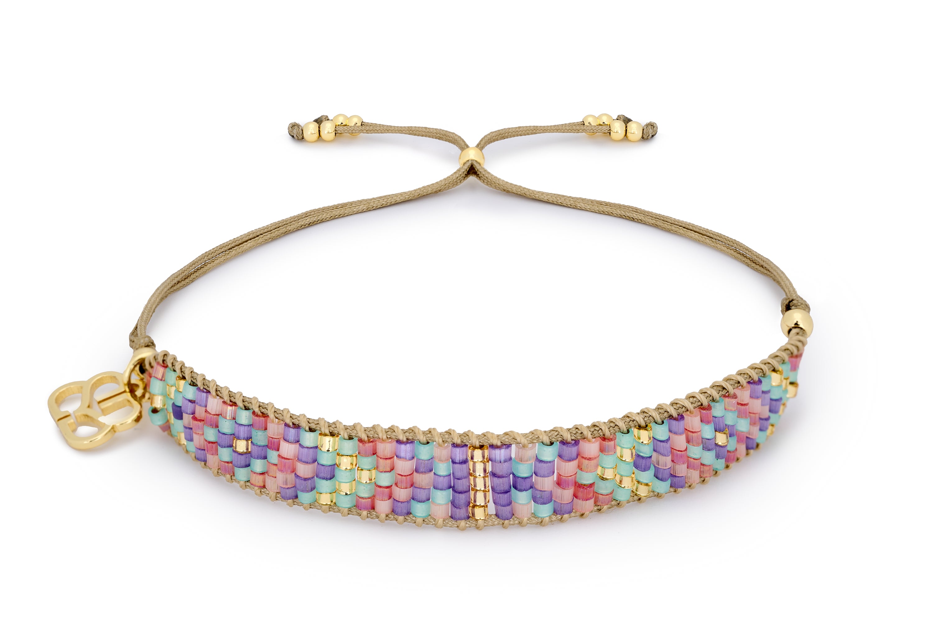 Lollipop Beaded Bracelet, a pastel Miyuki bead friendship bracelet by Boho Betty. Perfect for stacking and boho style.