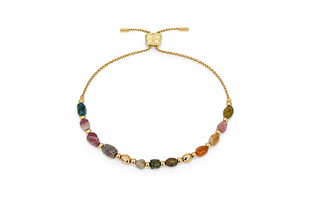 Rochelle Gold & Tourmaline Bead Slider Bracelet featuring colourful natural Tourmaline gemstones, organic gold beads and a waterproof 14k Gold PVD adjustable slider chain.