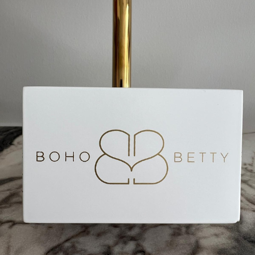 Close up of the shimmering Boho Betty Logo on our stunning new Single T Bar point of sale.