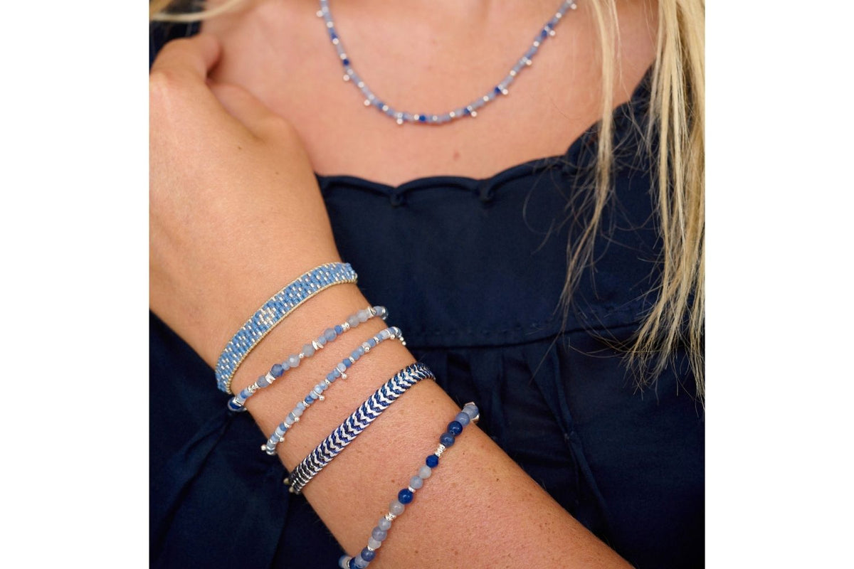 Bliss Blue Aventurine Silver Bracelet styled on the wrist, showcasing natural blue aventurine gemstones and waterproof silver PVD details designed for everyday wear and effortless layering.