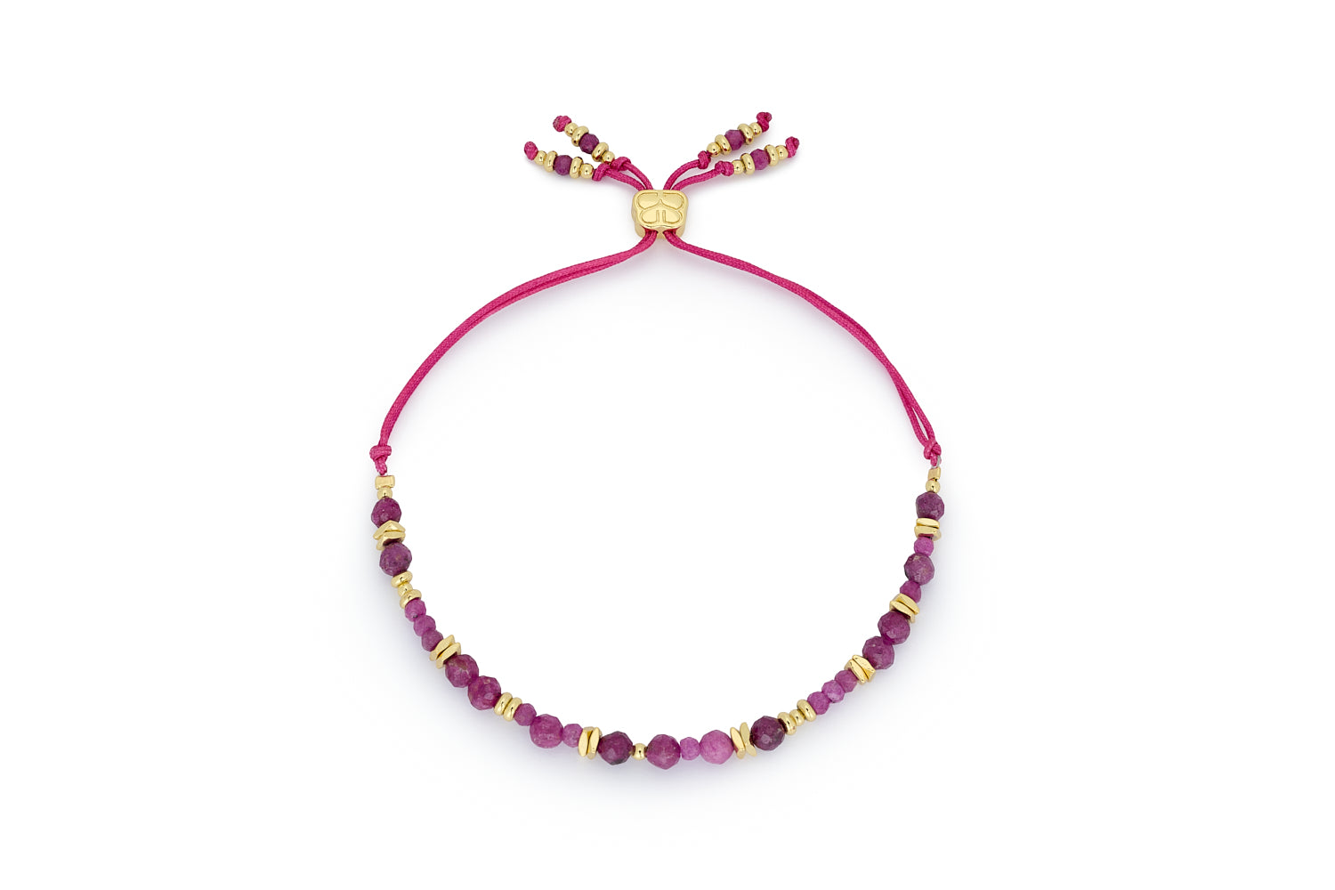 Bliss Ruby Gold Bracelet featuring vibrant faceted ruby gemstone beads, 12k gold-plated accents, and an adjustable slider fastening for the perfect fit.
